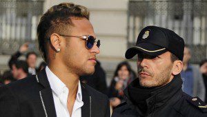 Barcelona's Brazilian forward Neymar (L) arrives to Spain's national court in Madrid on February 2, 2016. Barcelona star Neymar is called to give evidence this week a murky case over the deal which brought the Brazilian to the Catalan giants from Santos in 2013.