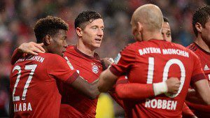 Bayern Munich's players (L-R) David Alaba, Robert Lewandowski and Arjen Robben celebrate the 2:0 during the German first division Bundesliga football match of FC Bayern Munich vs TSG 1899 Hoffenheim in Munich, southern Germany, on January 31, 2016. RESTRICTIONS: DURING MATCH TIME: DFL RULES TO LIMIT THE ONLINE USAGE TO 15 PICTURES PER MATCH AND FORBID IMAGE SEQUENCES TO SIMULATE VIDEO. == RESTRICTED TO EDITORIAL USE == FOR FURTHER QUERIES PLEASE CONTACT DFL DIRECTLY AT + 49 69 650050 / AFP / LUKAS BARTH / RESTRICTIONS: DURING MATCH TIME: DFL RULES TO LIMIT THE ONLINE USAGE TO 15 PICTURES PER MATCH AND FORBID IMAGE SEQUENCES TO SIMULATE VIDEO. == RESTRICTED TO EDITORIAL USE == FOR FURTHER QUERIES PLEASE CONTACT DFL DIRECTLY AT + 49 69 650050
